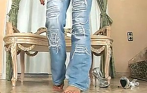 Busty brunette doll strips in solo action